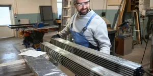 fabricator working with steel angles