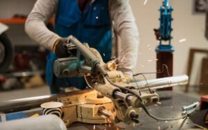 Metal fabrication with circular grinder